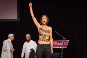 FEMEN protester crashes Muslim Conference in France. 